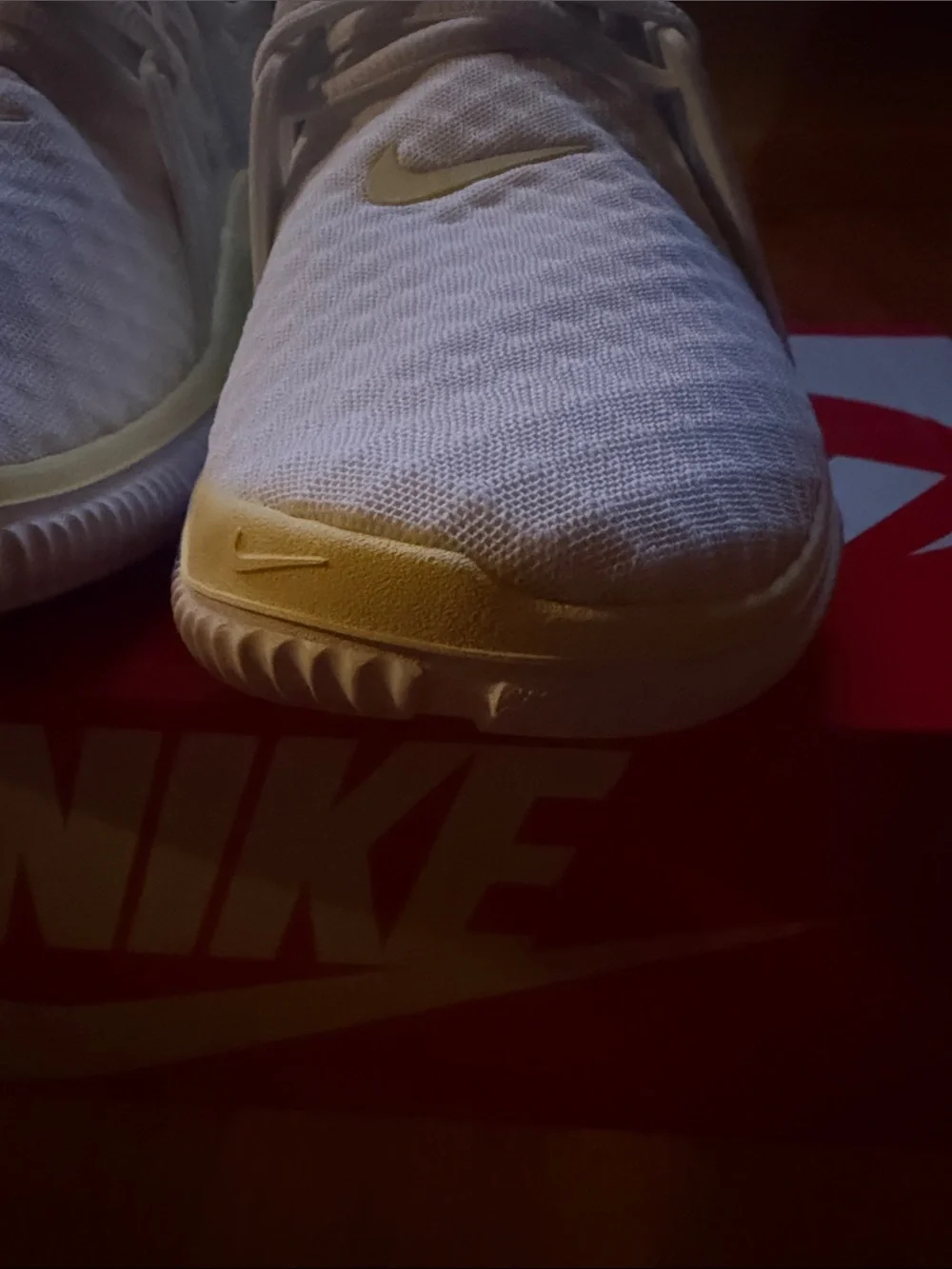 Nike White Athletic Sneakers with Blue Swoosh and Cream Trim